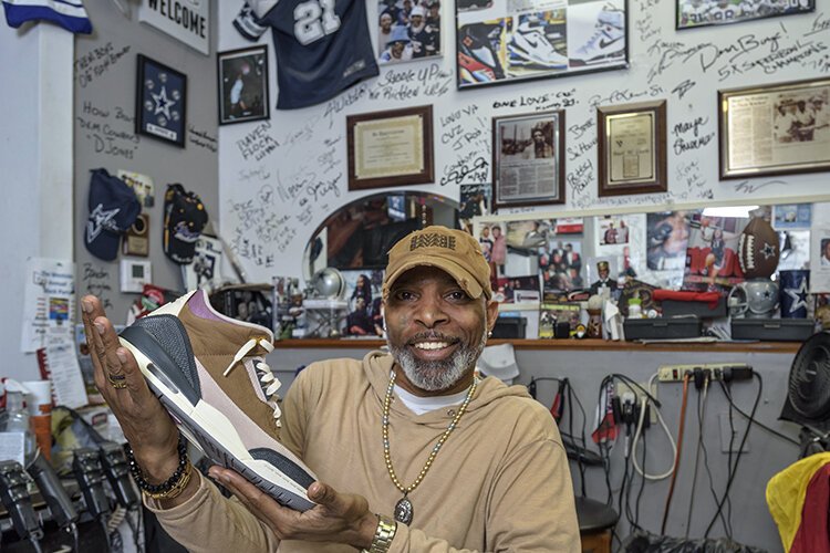 Basil Lewis holding Nike’s Air Jordan 3.