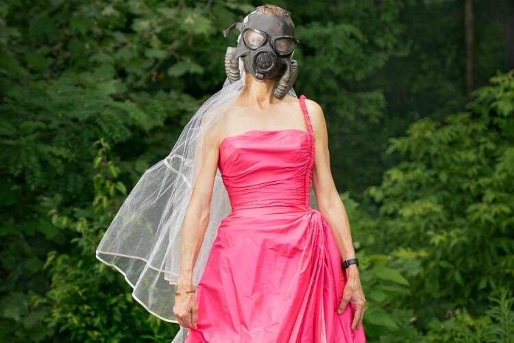 Pamela Jean Shaffer in formal gas mask attire (photo has been cropped)
