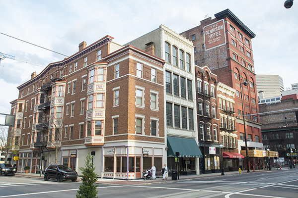 Across Main Street, the Dennison Hotel building faces a demolition request.