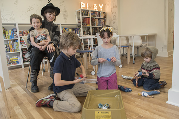 Children interact together at the Play Library.