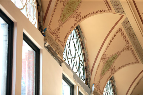 These windows, just below Music Hall's iconic rose window, were once covered over with bricks.
