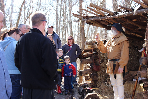 Guests enjoy a demonstration as part of Maple Sugar Days at Farbach-Werner Nature Preserve in Colerain Township.
