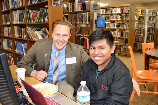 Covington city commissioner Jordan Huizenga mentors a student.