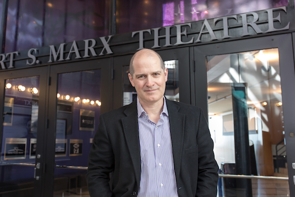 Blake Robison, artistic director for Playhouse in the Park, stands in front of the Marx Theatre, which will be demolished at the close of the 2018-2019 season.