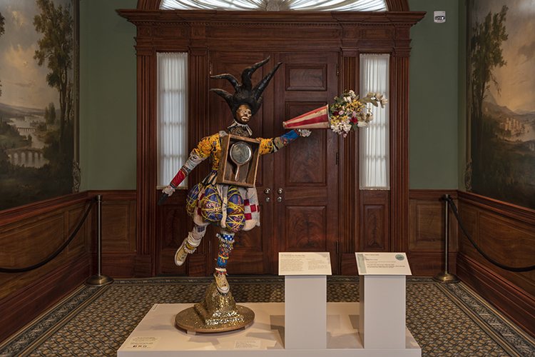 Her sculptures have been called “power figures,” evoking folk art traditions, religious icons, and African nkisi nkondi.