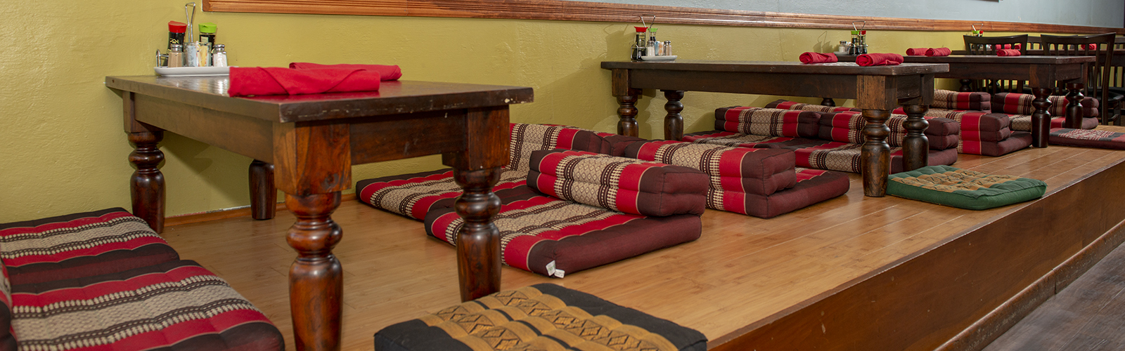 The interior at Ruthai's Thai Kitchen offers comfortable floor seating.