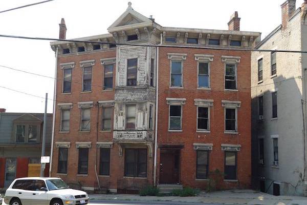 A developer acquired 1925 Vine St. through OTR A.D.O.P.T. and plans to redevelop the building into 20 residential units.