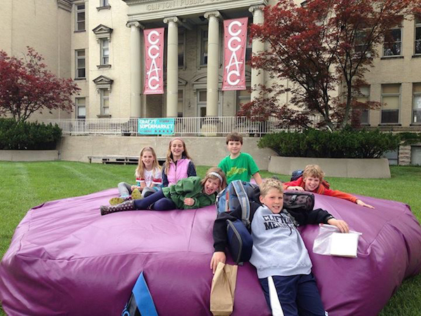 Earlier this year, kids enjoy Plop! in front of the Clifton Cultural Arts Center.