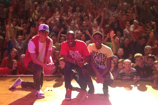 Keenan West (center) with dancers Jeff Bullis and Romelo Thomas present last year to Indian Hill Middle School students