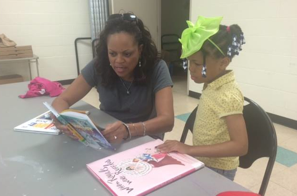 Sheryl McClung McConney does hands-on teaching during the Summer Academic Enrichment program