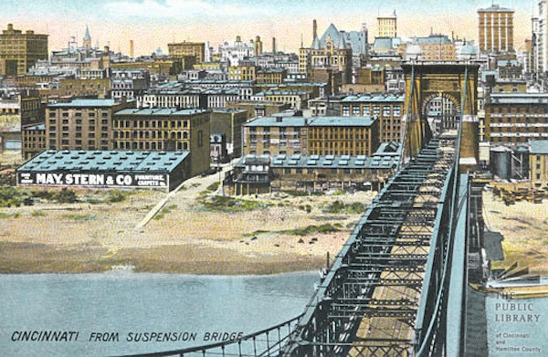 Here's a postcard showing riverfront buildings near the Roebling Suspension Bridge