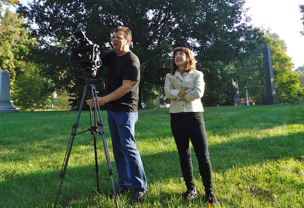 Andrea Torrice and videographer Dave Morrison on location in Spring Grove Cemetery