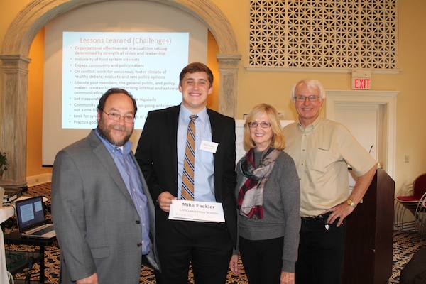 Greater Cincinnati Regional Food Policy Council Director Angie Carl with (L-R) City of Cincinnati's Larry Falkin, Loveland student Mike Fackler and food policy expert Mark Winne 