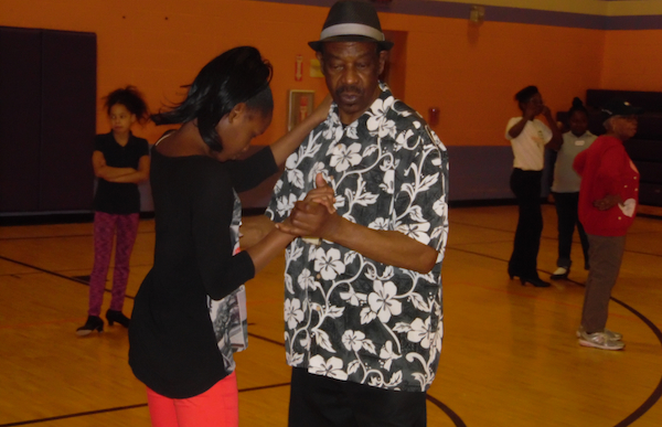 Greg Norman and Kathye Lewis teach students learn to dance at South Avondale Elementary