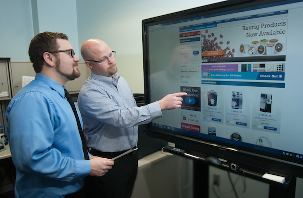 VIE Ability staff use an adaptive computer screen
