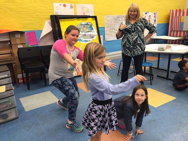 A group of kids in one of last year's ArtStop Artist Series workshops learned how to communicate through dance.