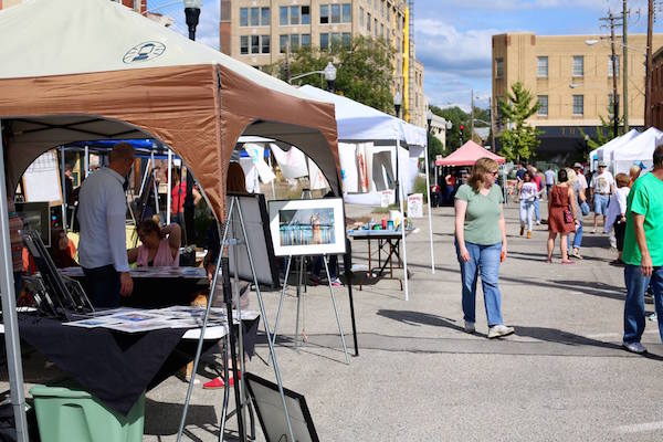 Artists set up in tents along Seventh Street during last year's Art Off Pike.