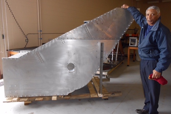  Fred Williams stands with his design, the Williams Cross-Flow Turbine. 