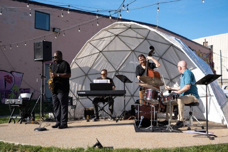 Bands playing at CampSITE Sculpture Park.  