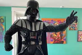 A life-size Darth Vader keeps an eye on things. 