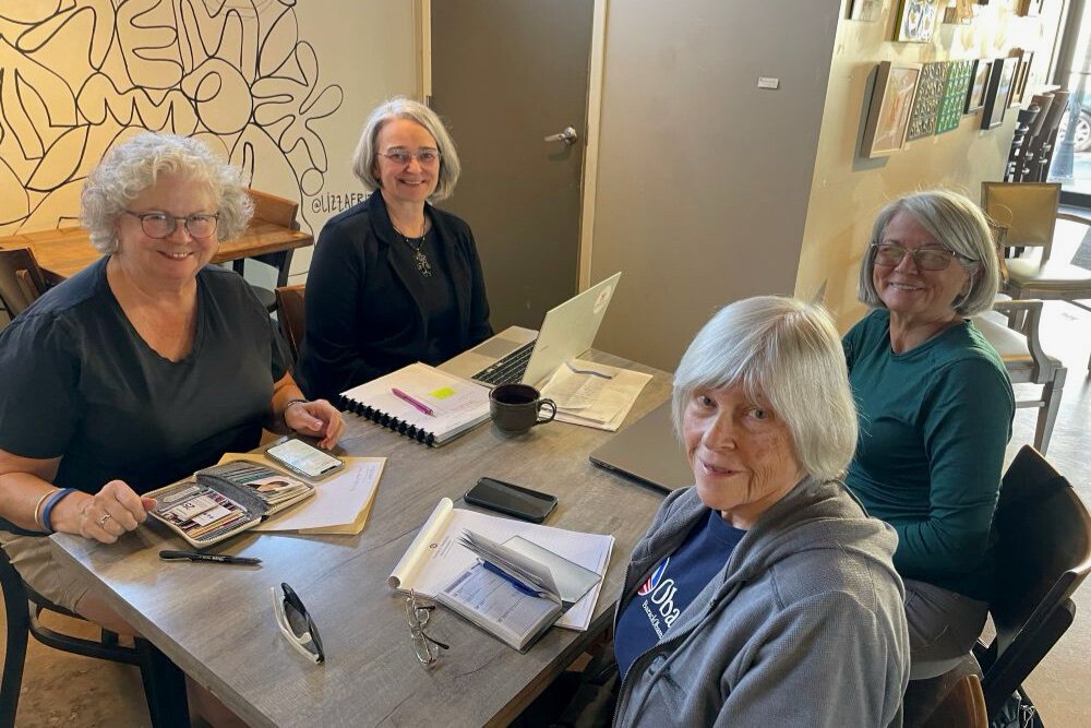 Beth Benson (second from left) meets with SVP coaching team (left to right) Susan Ingmire, Carol Aquino, and Melisse May.