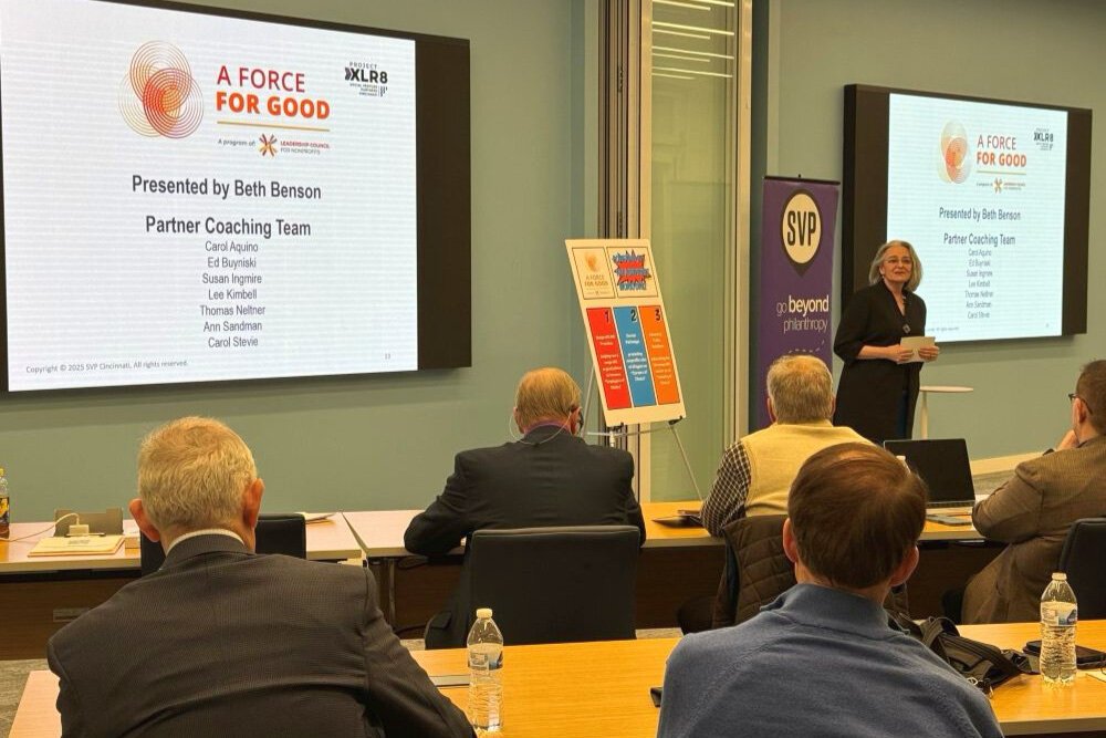 Leadership Council for Nonprofits executive director Beth Benson makes her presentation of the A Force for Good initiative to the SVP team.