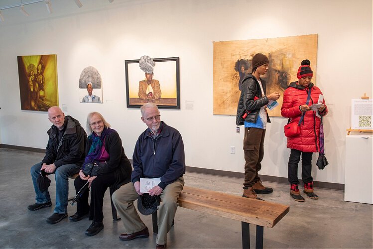 Guests enjoying the first exhibit in CCAC’s Nourse Gallery; Erin Smith Glenn, winner of the inaugural New Woman juried exhibition and accompanying residency at CCAC, presented HAIRitage.