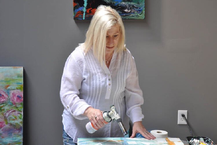 Shari Repogle in her encaustic art studio. 