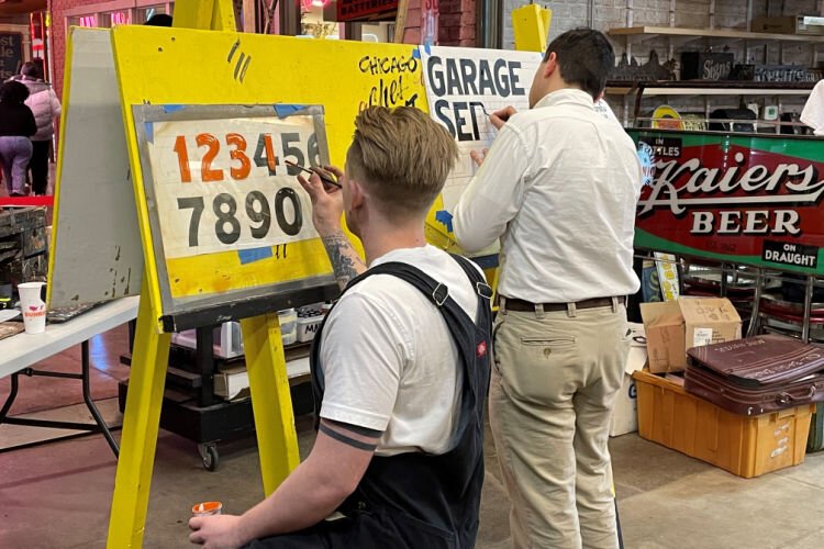 Sign painting demo last year at the American Sign Museum. 