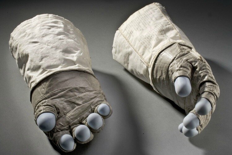 Buzz Aldrin's gloves with handwritten reminders