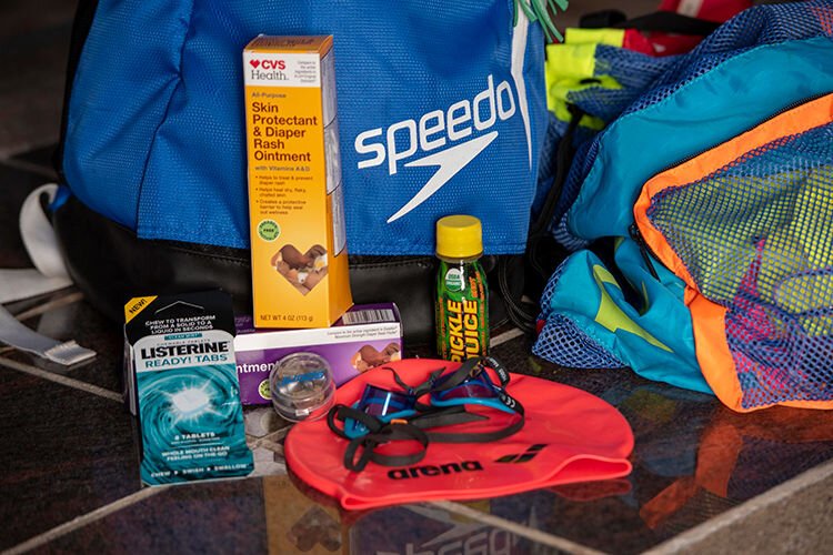 Some necessary items for the swim. Pickle juice helps with cramping and the Listerine lozenges help counter the effects of saltwater, which can swell your tongue.