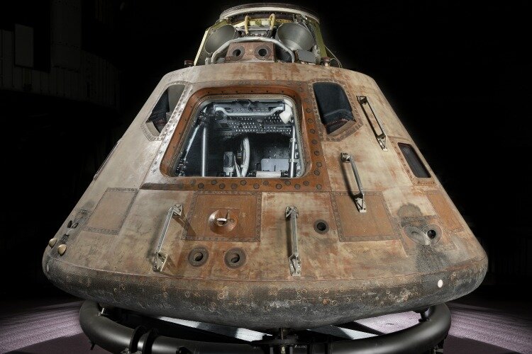 The Apollo 11 command module, Columbia, weighs 13,000 pounds.