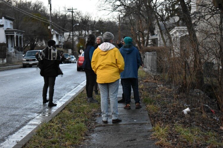 The committee looks at an illegal dump site on Cass Street with Keep Cincinnati Beautiful and a rep from Councilman Pastor's office.