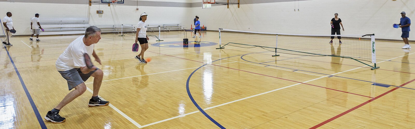 Indoor pickleball courts at Bond Hill Recreation Center. 