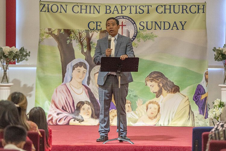 Rev. Van Thuam Cin hopes his Zion members find “peace and love” at these two-hour services, far from the physical and psychological persecution of Christian Chin in Myanmar.