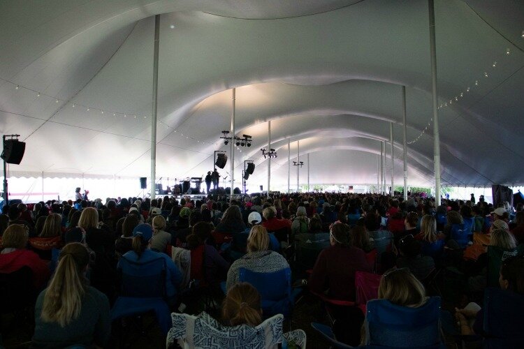 Watts leads the prayer team for Crossroads' annual Woman Camp.