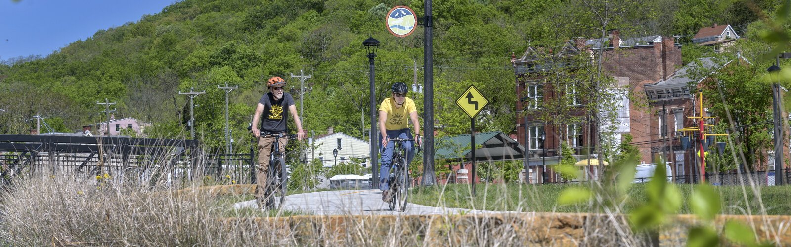 l to r: UC Research Asst. Prof. Geography, Chris Carr and Director of Tri-State Trails, Wade Johnston at Lick Run Greenway, right at the tip of Queen City off the Harrison Ave viaduct.