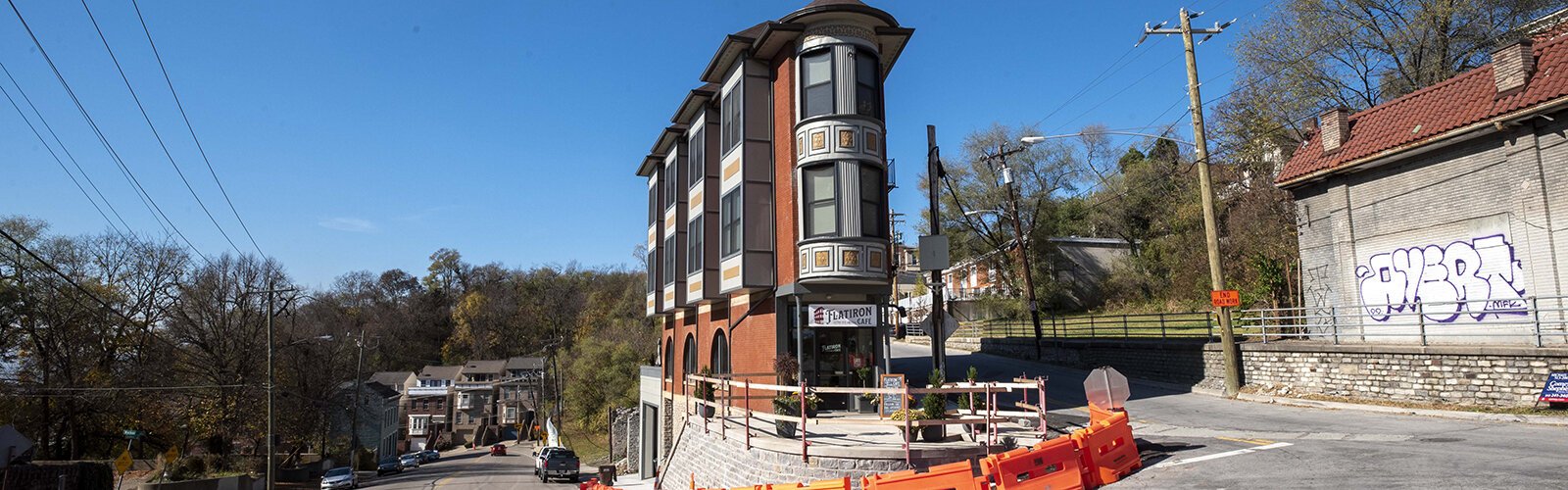 The landmark flatiron building is at the top of Sycamore Street, where Sycamore winds past Dorchester Avenue and then widens into Auburn Avenue.