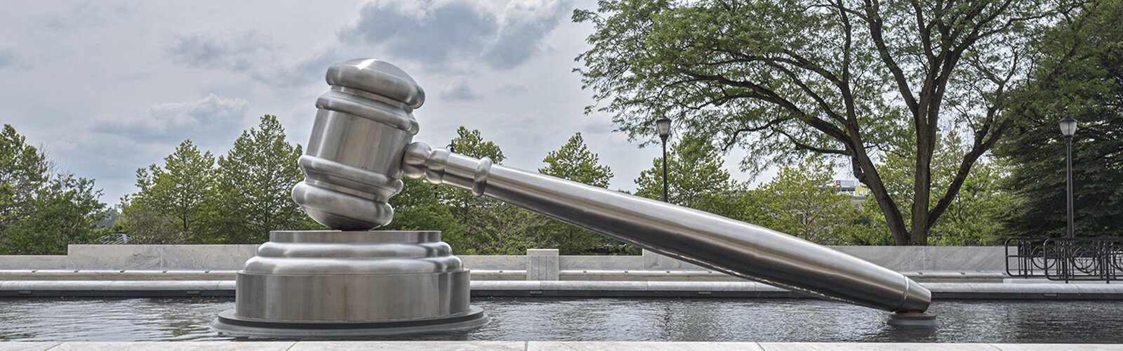 “Gavel” by African-American multimedia artist and sculptor, Andrew F. Scott, located in the south reflecting pool outside the Supreme Court of Ohio.