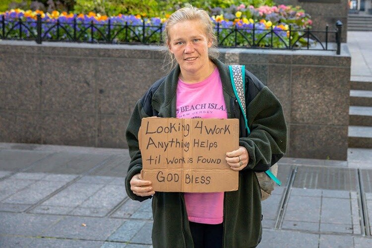 The Jobs Van picks up 10 panhandlers a day and gives them work.