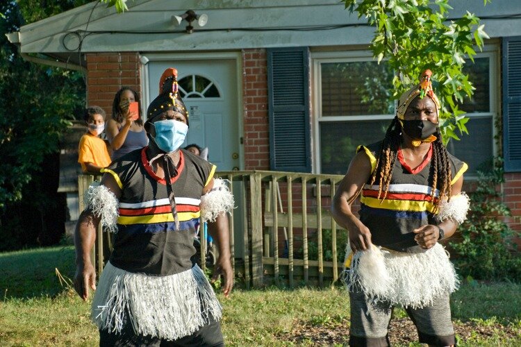 The Afrakan Artist Alliance consists of Nigerian-based drummers and dancers, and costumed stilt walkers. 