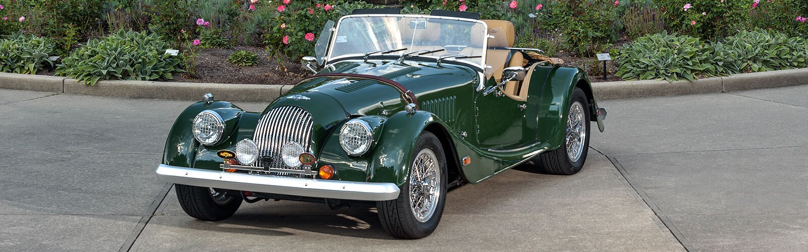 Constructed by hand with retro-chic lines, the 1985 Morgan Plus 8 is a swift, two-door roadster that remains popular with car buffs.
