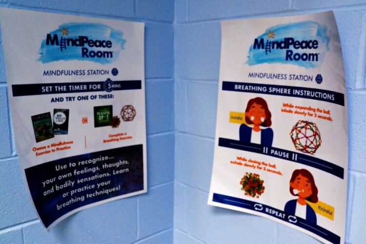 Instructions posted inside the MindPeace Room guide youth through simple breathing and mindfulness exercises, tools that help regulate emotions and prevent escalation.