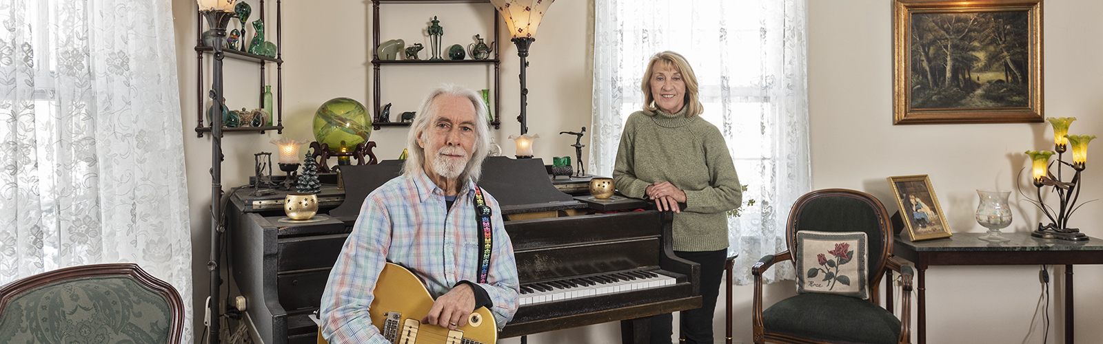 Gerald Parker, a singer and guitarist with Haymarket Riot, and his wife Susan at their New Richmond farm.