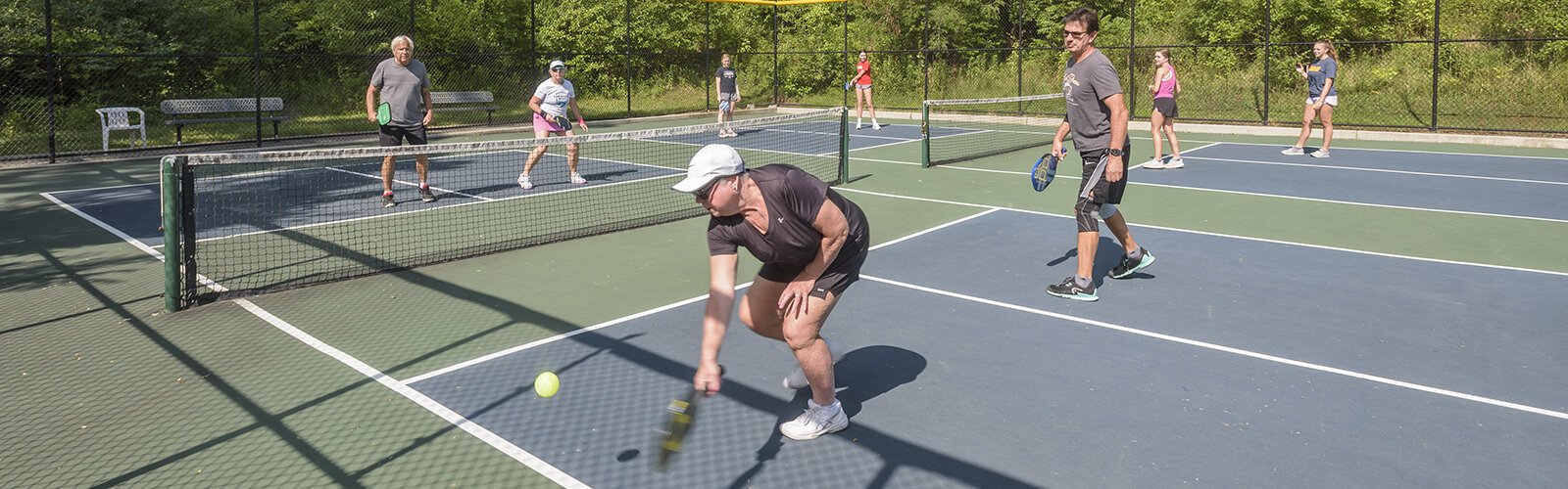 Bicentennial Park pickleball front l to r: Gary Stigler, Marsha Kelpe, Joe Hennard, Laura Shaw; back court l to r: Bella Maxfield, Georgia Doyle, May Humpert and Carly Acito.