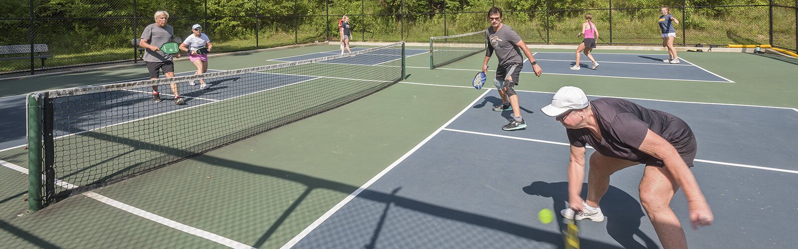 Bicentennial Park pickleball front l to r: Gary Stigler, Marsha Kelpe, Joe Hennard, Laura Shaw; back court l to r: Bella Maxfield, Georgia Doyle, May Humpert and Carly Acito 