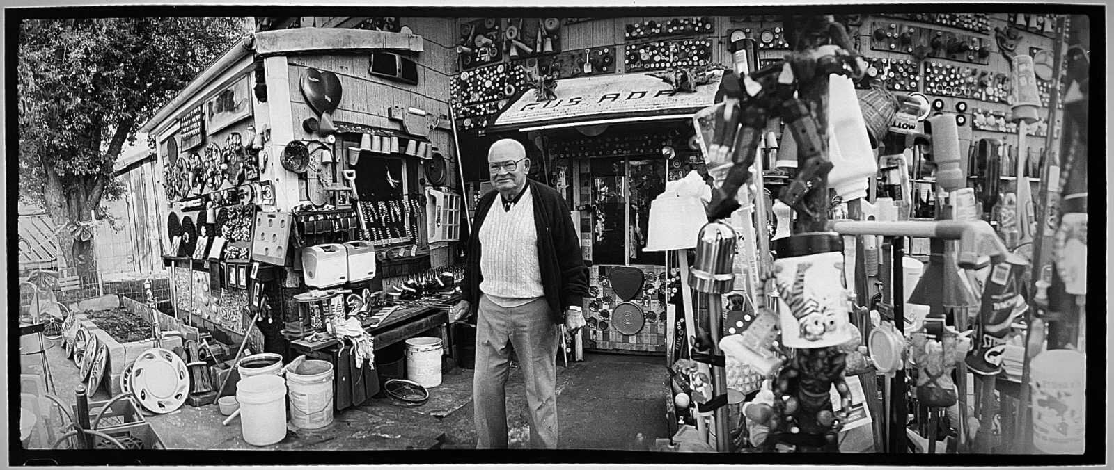 Junk Collector Louisville Kentucky, 1998. Black and white fiber print, 7½ x 18 inches. Examining the effects of consumption, collection, and what is discarded, What’s Left Behind is a juried group show at Kennedy Heights Arts Center.