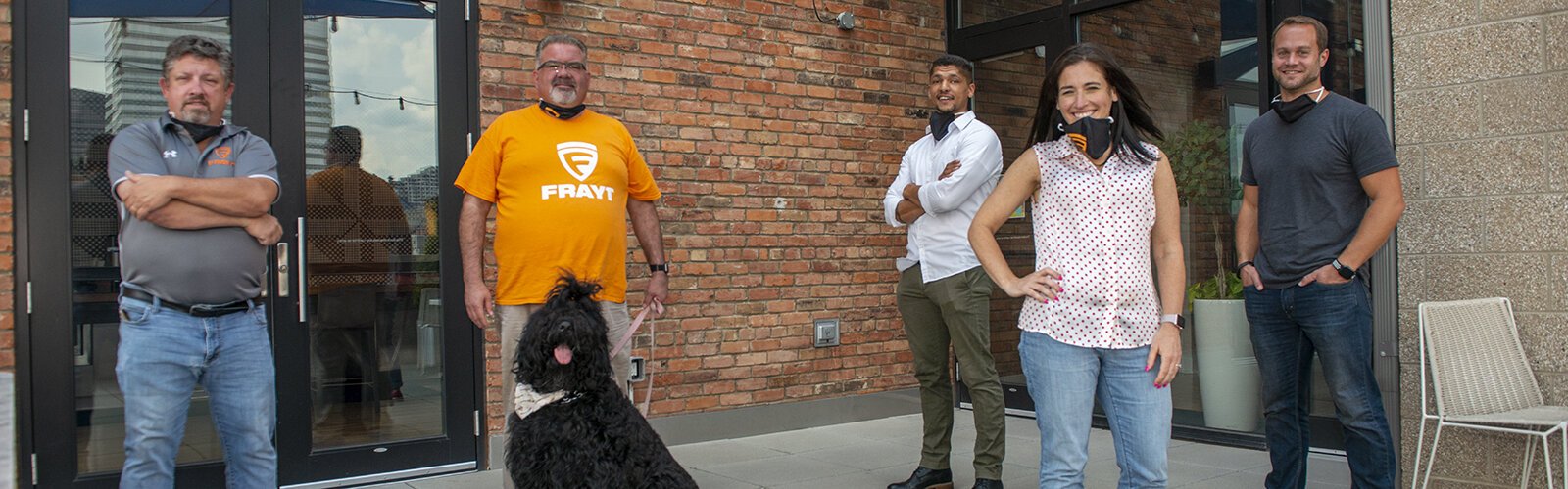 CEO of Frayt, Lawrence MCord with his dog, Yana, and coworkers Dave Anderson, Marek Haile, Olivia Overton, and Ben Klinger.