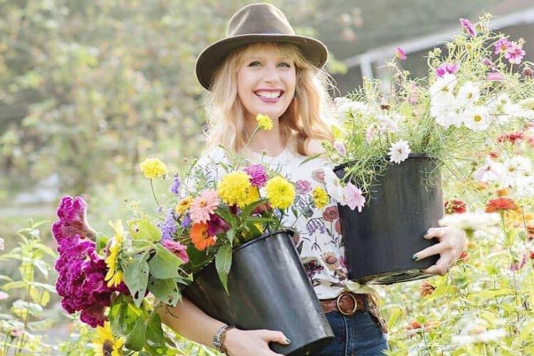 Christina Matthews, owner of The Flower Lady LLC., also volunteers in the People's Garden.