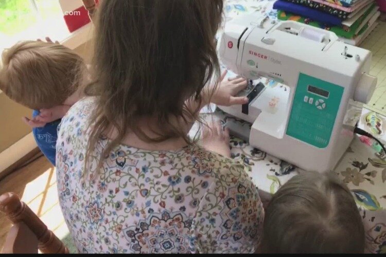 Katie Hodge, who has type 1 diabetes, continues to stay inside and make masks with her children.